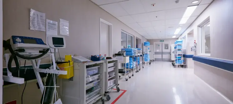 shot-of-an-empty-passage-way-with-medical-equipmen-2025-04-06-08-54-34-utc